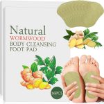 image of foot pads in use - هانيل لصقات إزالة السموم من القدم
